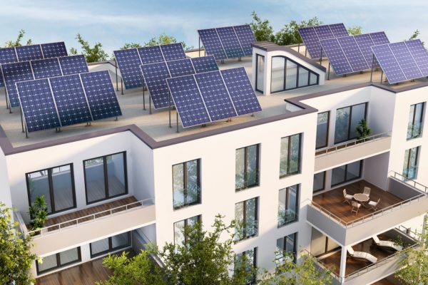 Residential,Building,With,Solar,Panels,On,The,Roof.,3d,Rendering Residential,Building,With,Solar,Panels,On,The,Roof.,3d,Rendering